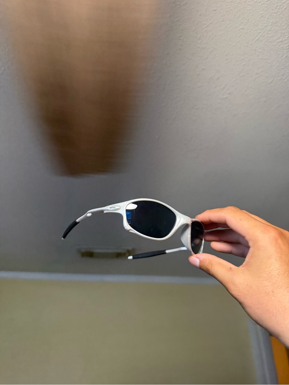 White and Black Sports Sunglasses with Polarized Lenses Oakley